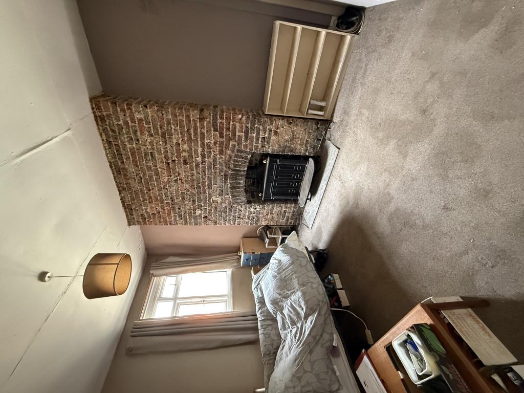 Lot: 82 - MIXED RESIDENTIAL AND COMMERCIAL BUILDING WITH POTENTIAL - Additional reception room with exposed brick chimney breast